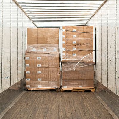 pallet's of boxes in the trailer of a semi truck