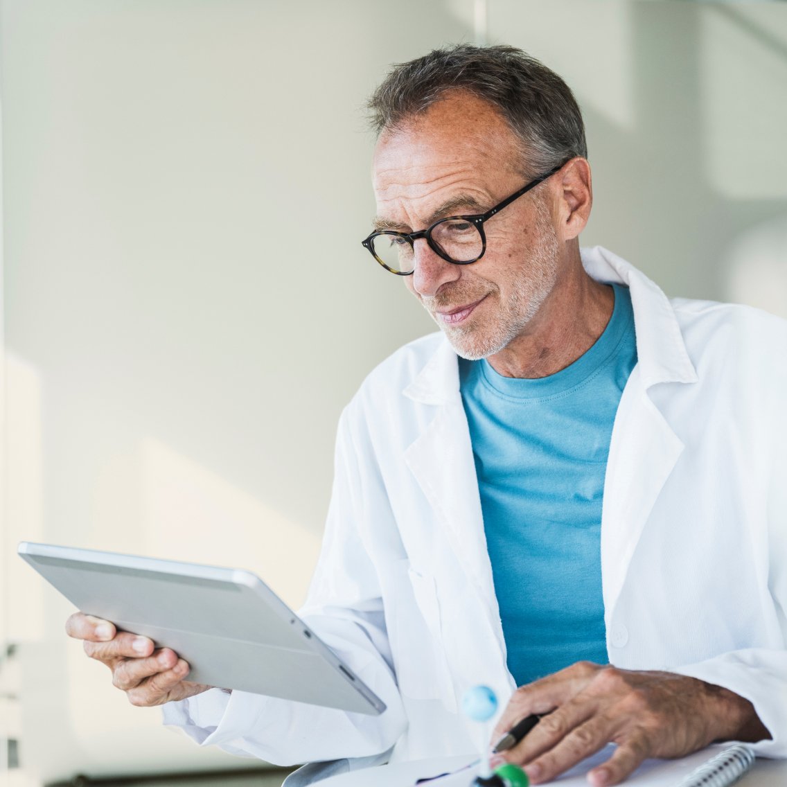 Oncologist reviewing data insights