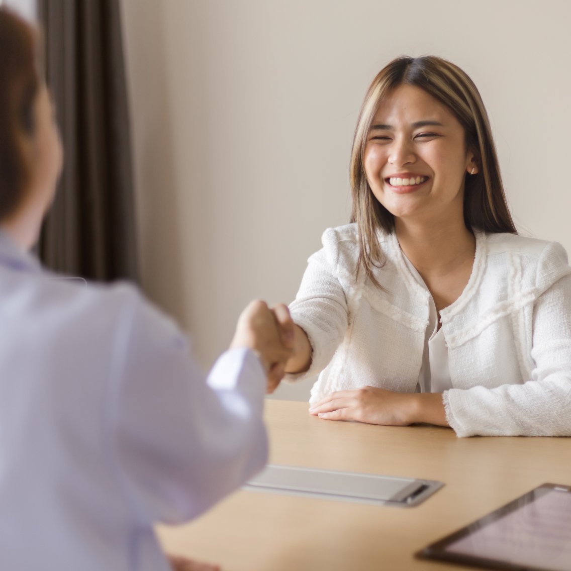 Oncologist discussing capital assistance programs with oncology physician network