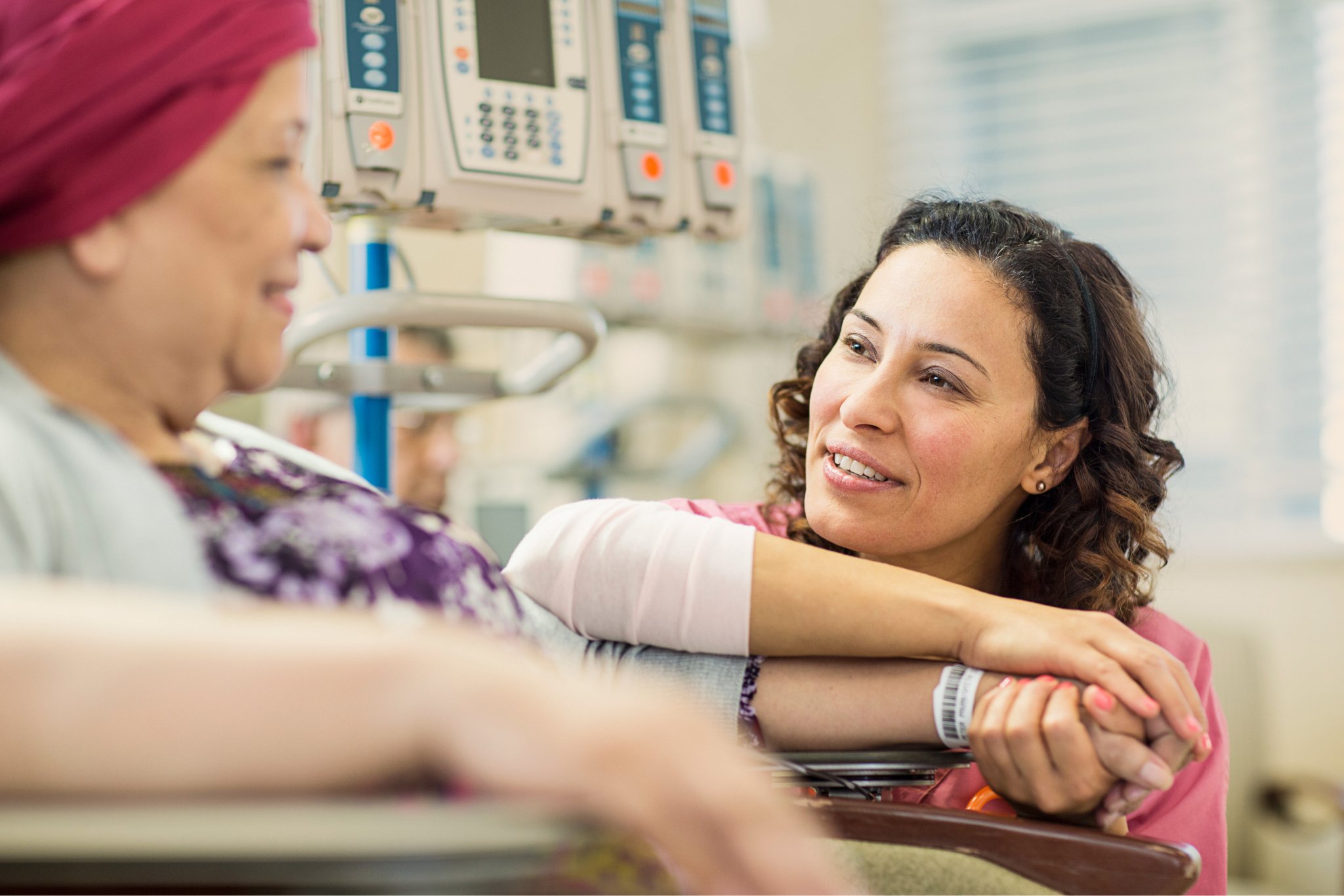 Oncologist providing cancer care to patient of community oncology practice.