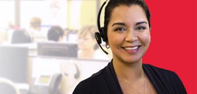 Customer service rep wearing a headset.