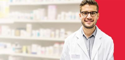 Pharmacist wearing a white coat.