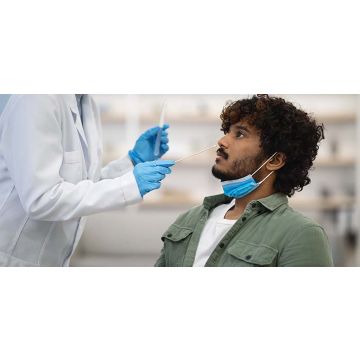 Patient getting his nose swabbed.